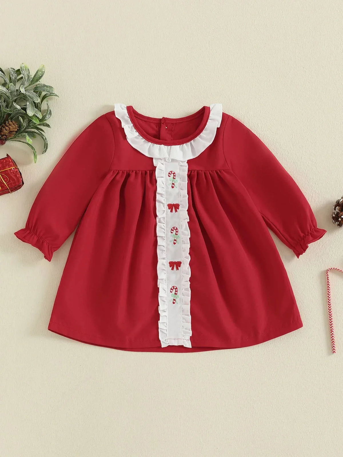 Red holiday baby dress with candy canes and white ruffle trim, long sleeve for infants