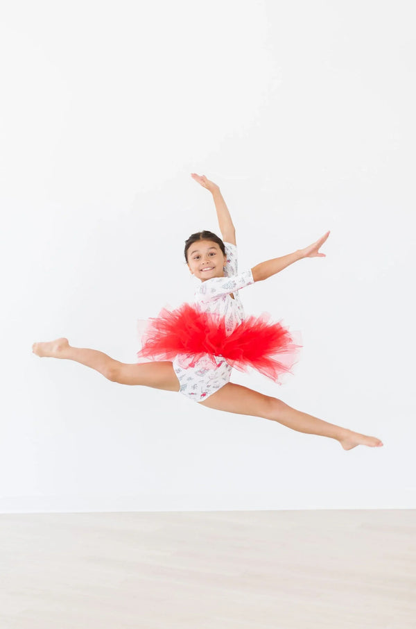 holiday red tutu leotard for girls 3 4 sleeve with bright red tutu skirt worn by young dancer