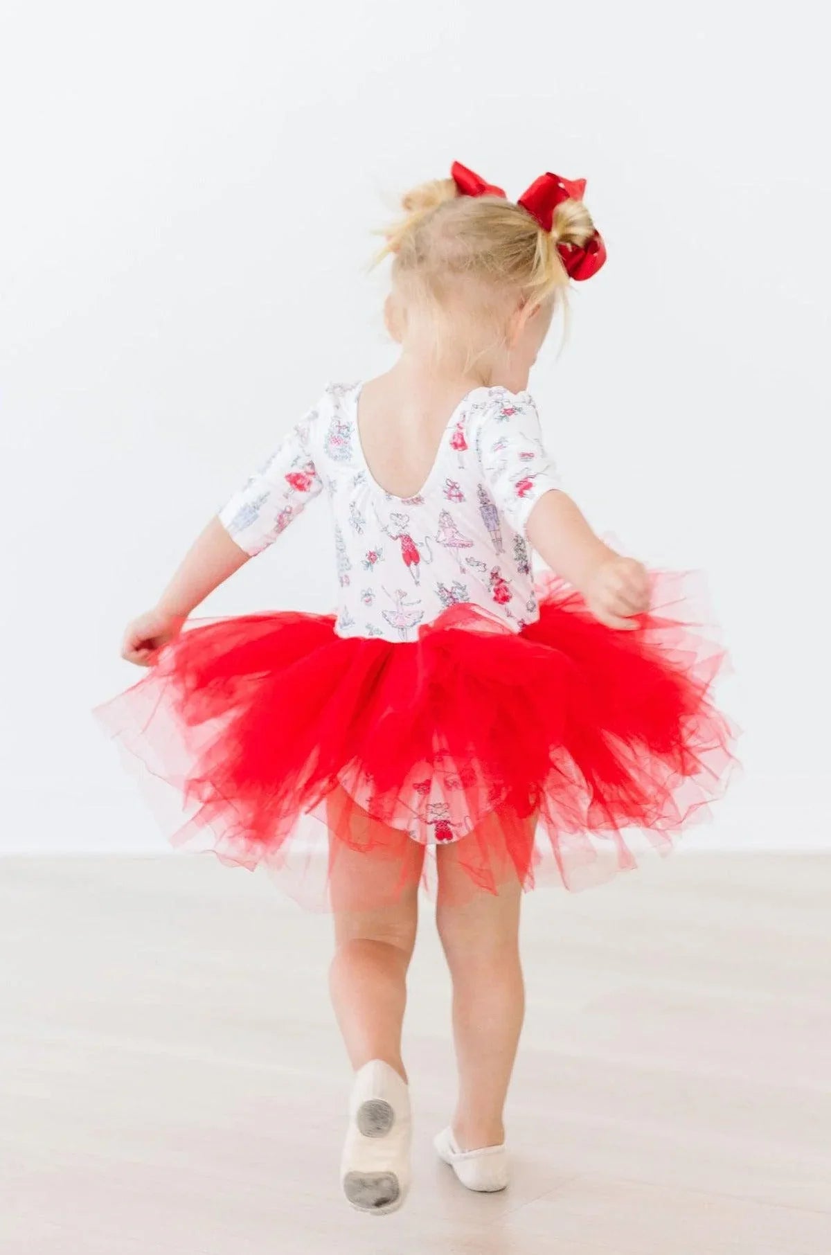Holiday red tutu leotard for girls by Mila Rose with 3/4 sleeves and festive design for toddlers