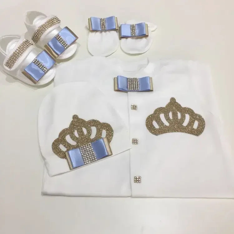 white homecoming baby outfit set with blue bow and gold crown decorations for newborns