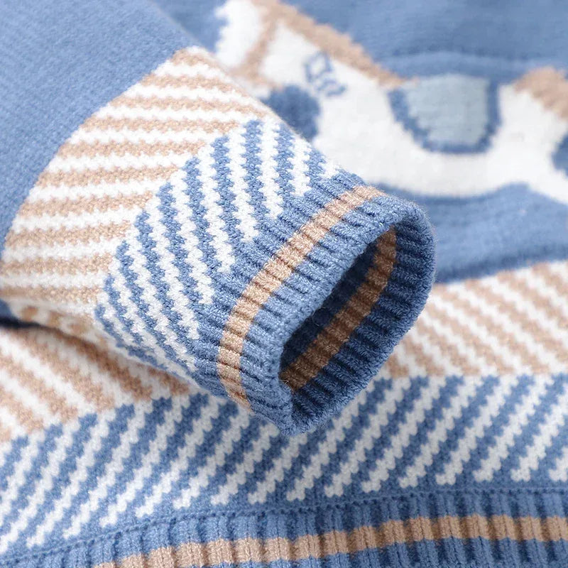 Blue and beige horse themed baby romper for infants with long sleeves and striped knit pattern