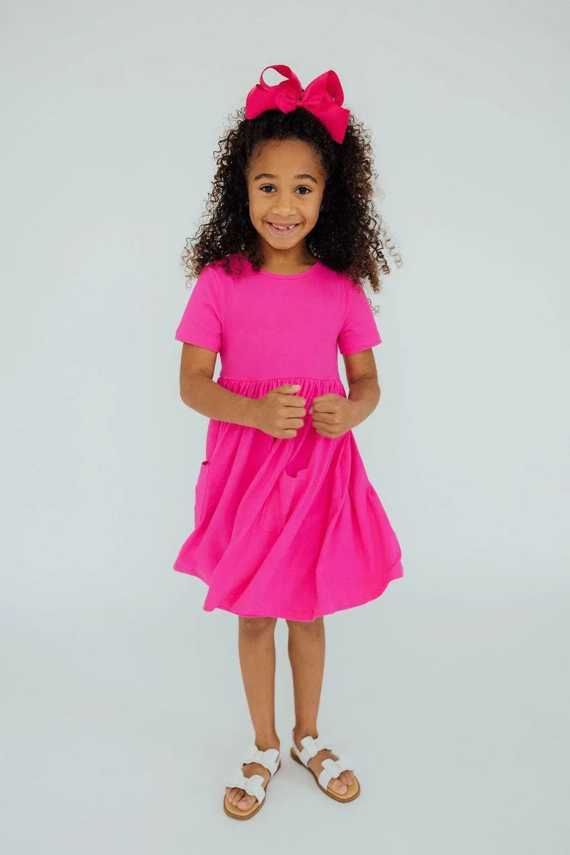 Girls hot pink twirl dress for girls with short sleeves and gathered waist by Mila & Rose