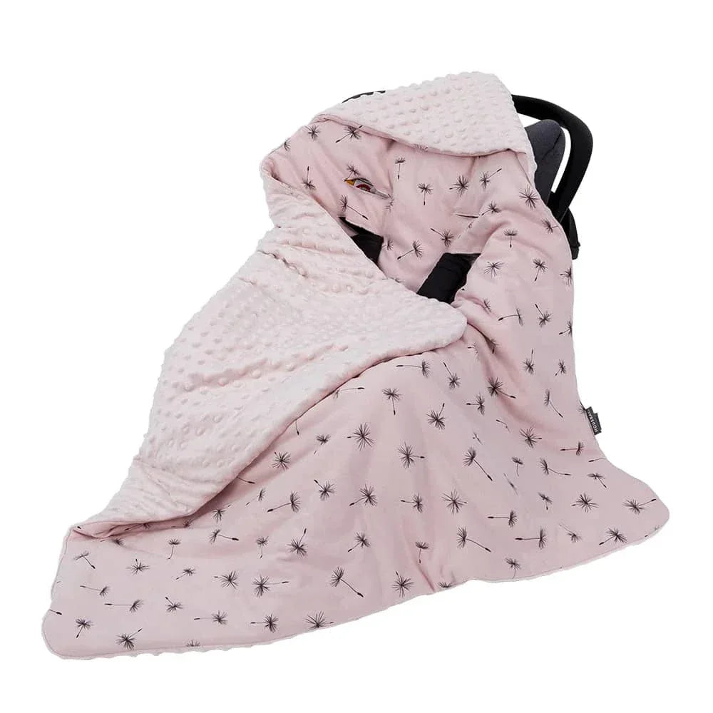 Pink ultra soft baby swaddle blanket with black dandelion print and plush minky fabric lining