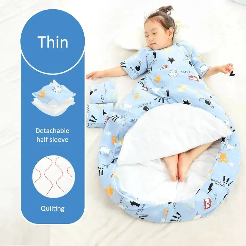 toddler girl sleeping in light blue zippered sleeping bag for kids with animal prints and detachable sleeves