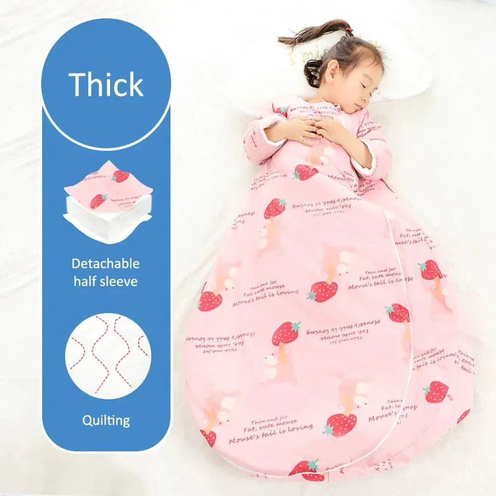 Toddler girl sleeping in pink zippered sleeping bag for kids with strawberry print and detachable half sleeve