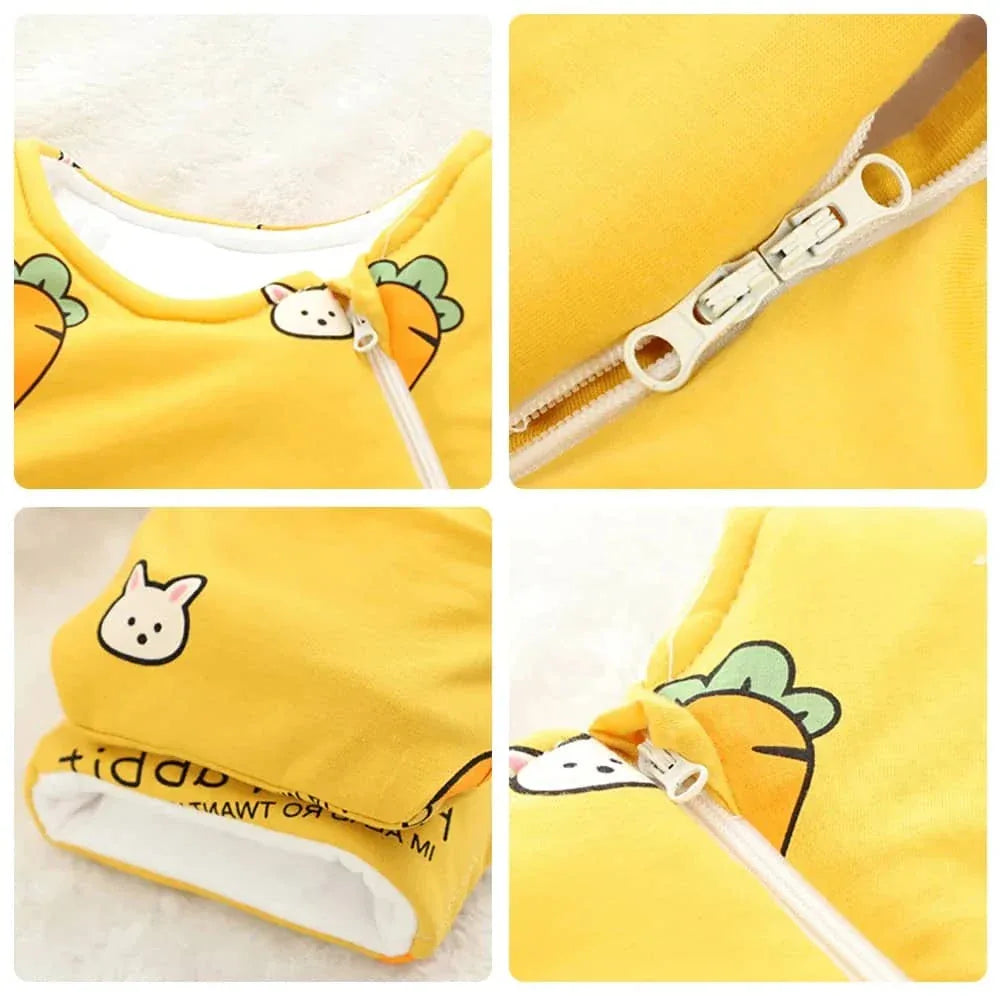 Yellow zippered sleeping bag for kids with bunny and carrot prints, close-up of zipper and fabric details