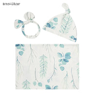 white and blue floral baby swaddle blanket set with hat and headband for newborns