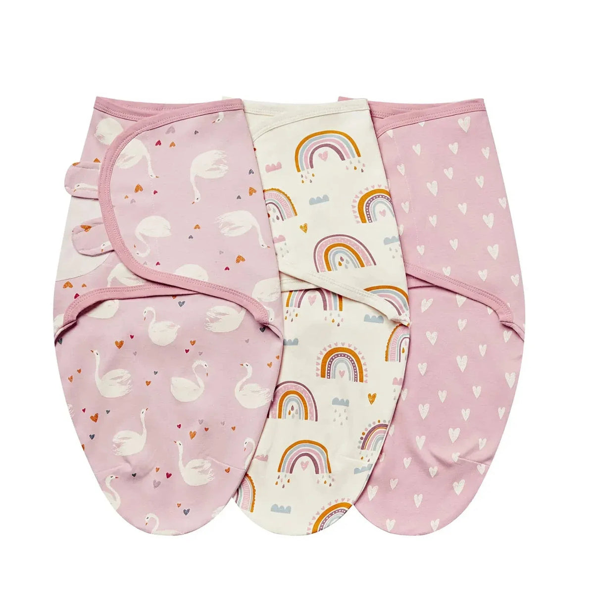 Set of pink and white cotton swaddle bags for babies with swan, rainbow, and heart patterns