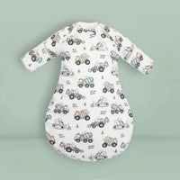 White cotton toddler sleep sack with zipper featuring blue and brown construction truck prints