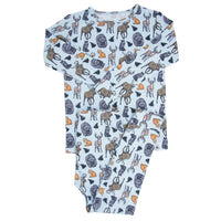 Light blue big kid pajama set featuring a long sleeve top and pants with a whimsical forest animal print of moose, deer, foxes, and bears.