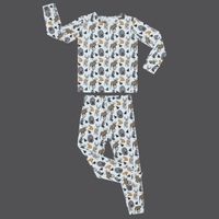 Into the Wild big kid pajama set featuring moose, bears, deer, and foxes on a light blue long sleeve top and pants.