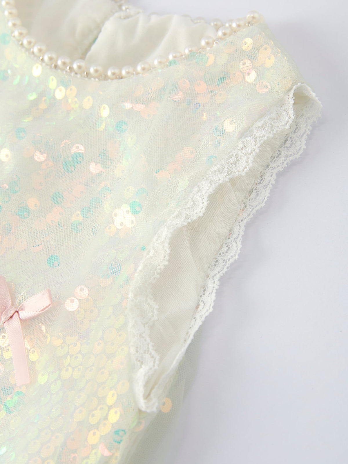 Rylee Faith Designs iridescent sequin girls dress with pearl neckline and lace trimmed sleeves