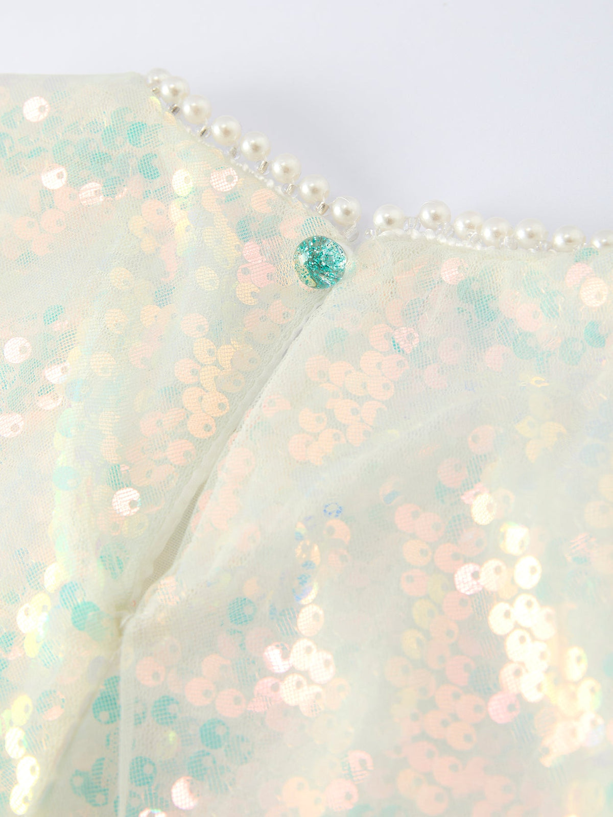 Rylee Faith Designs iridescent sequin girls dress with pearl trim and button detail