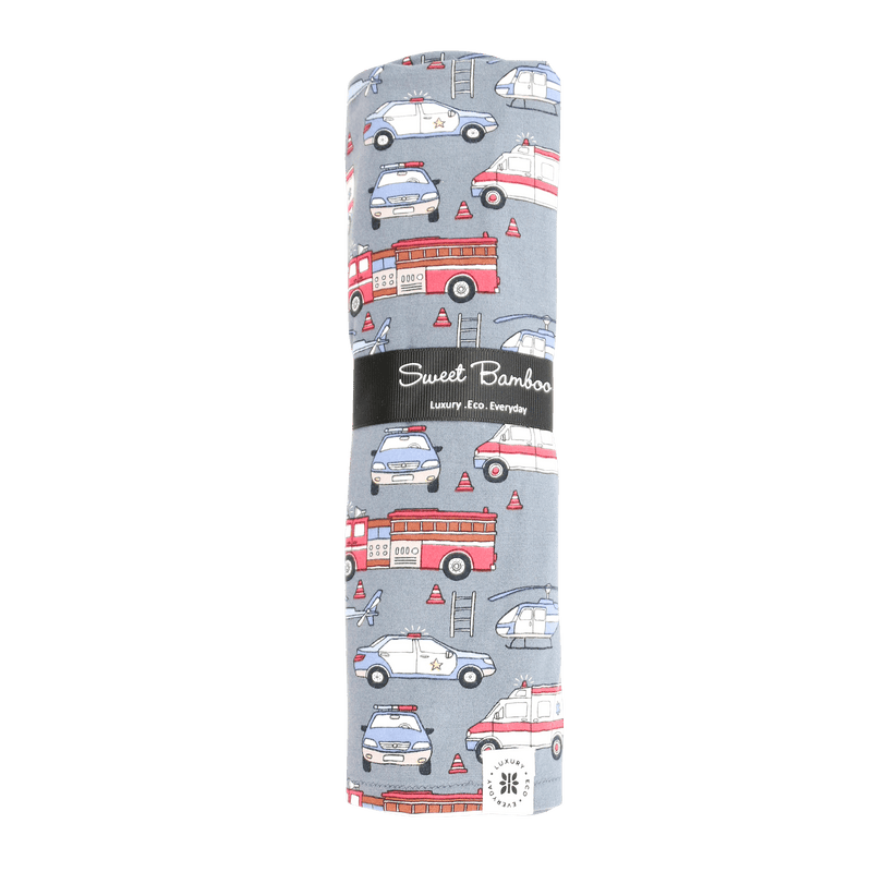 Roll of paper towel with emergency vehicle design on a green background
