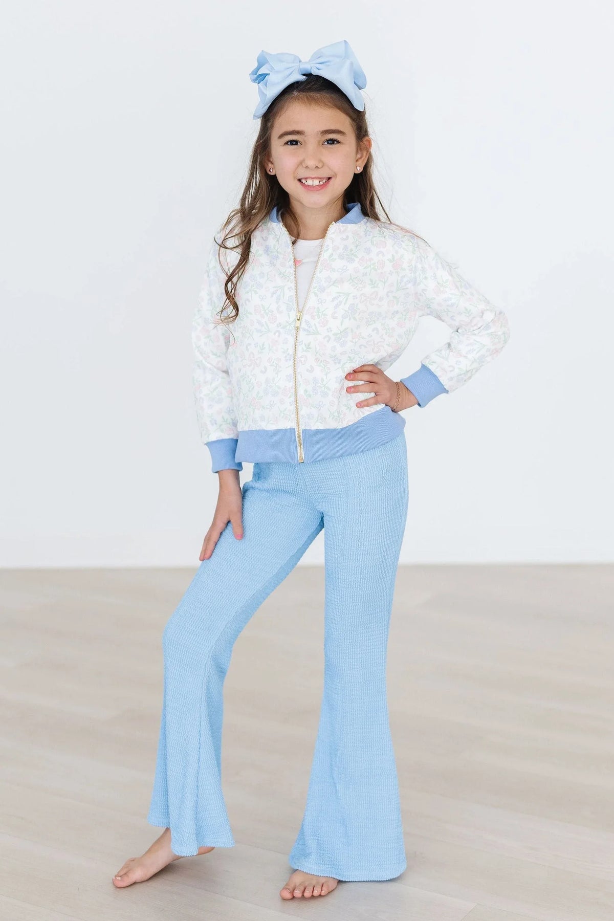 Girls white satin jacket for girls with light blue cuffs and zipper, floral print, long sleeve
