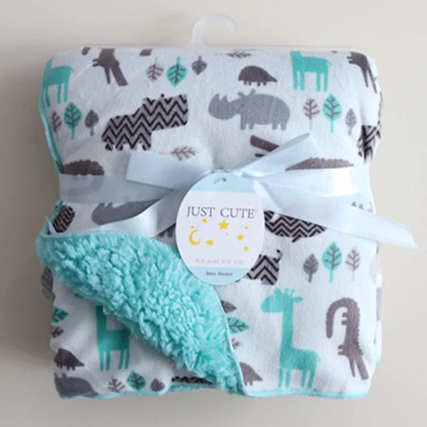 cozy fleece baby blanket in white with teal and gray animal prints, suitable for infants and toddlers
