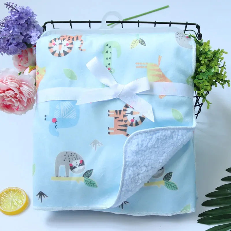 baby blue cozy fleece baby blanket with colorful animal prints for infants