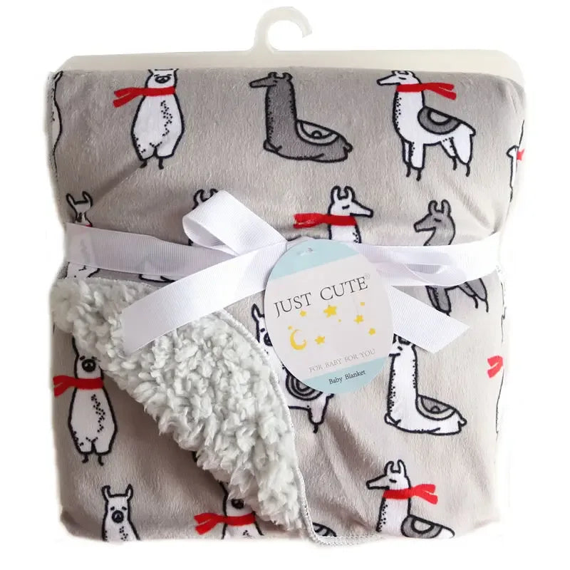 Cozy fleece baby blanket in gray with llama print and red scarves, perfect for infants