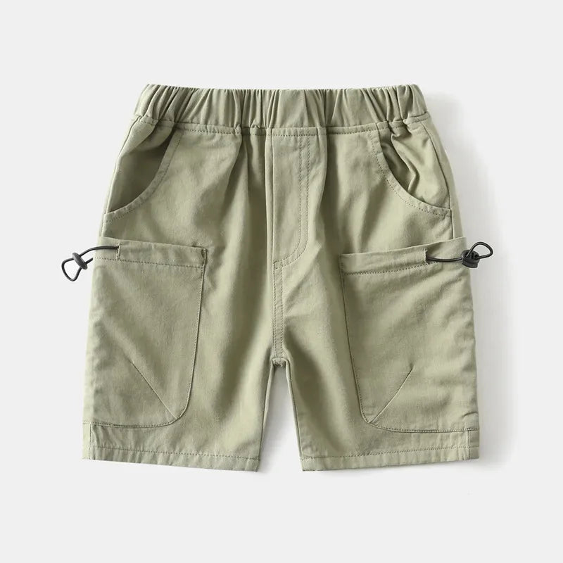 Light green toddlers boys cargo shorts with pockets laid flat showing elastic waistband and side details