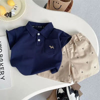 kids khaki shorts set with beige anchor print shorts and navy blue polo shirt for toddlers