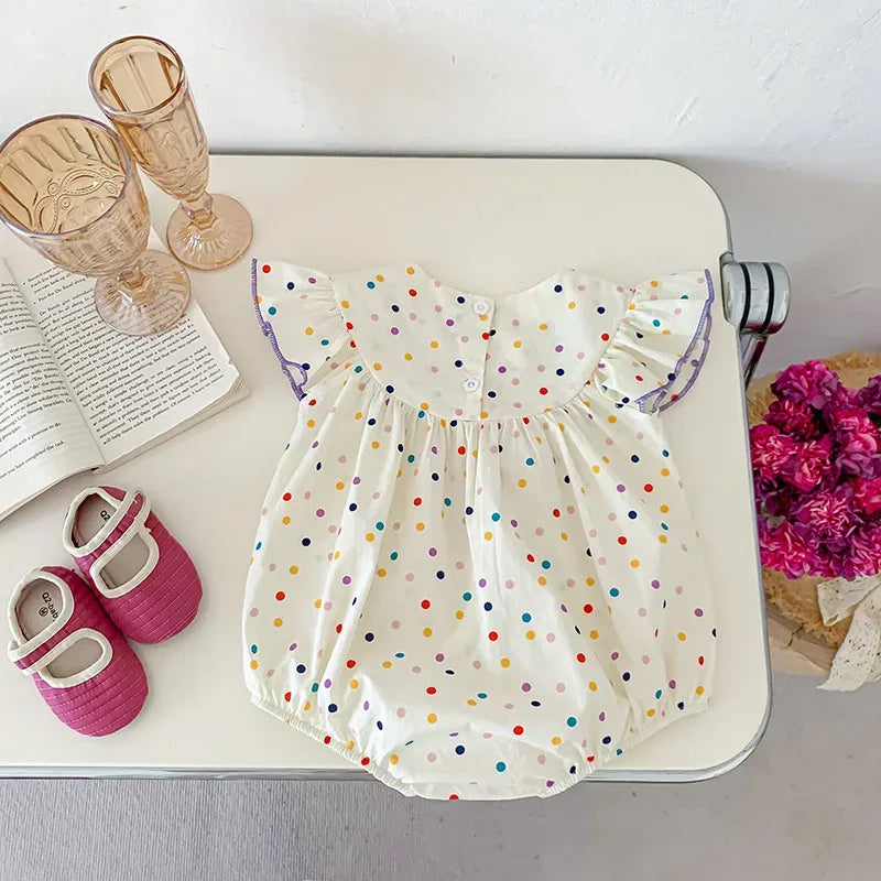 Baby white polka dot romper with colorful dots and ruffled short sleeves for infants