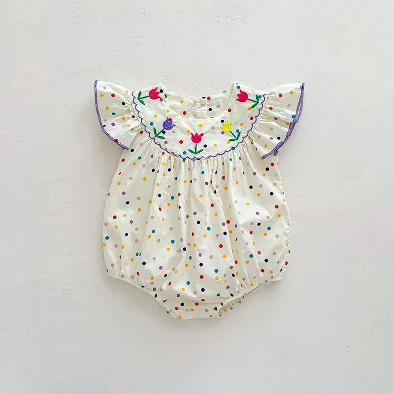 baby cream polka dot romper with colorful floral embroidery and ruffled sleeves