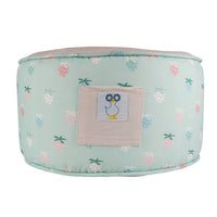 Goosewaddle pouf for kids in pastel green with strawberry print and penguin patch for toddlers