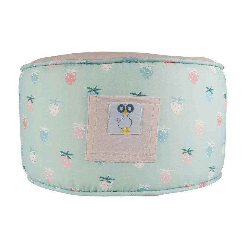Goosewaddle pouf for kids in pastel green with strawberry print and penguin patch for toddlers