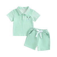 toddler boys mint green shorts set with striped polo shirt and embroidered detail