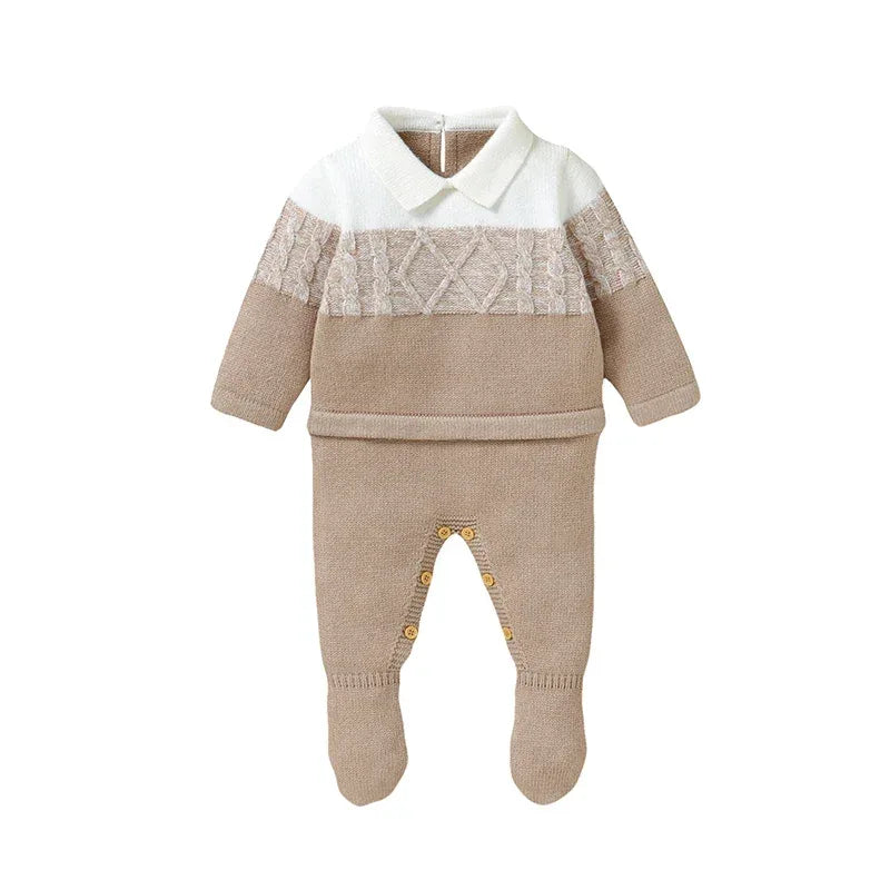 beige and white knit footed romper for infants with cable knit detail and collar