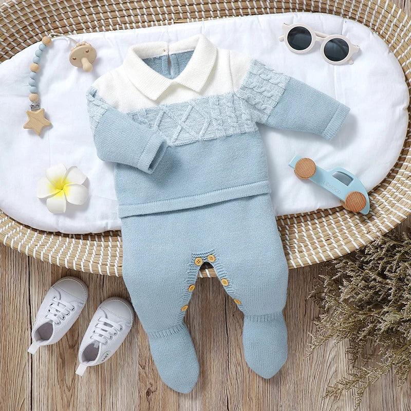 Baby blue and white knit footed romper for infants with collar and button details