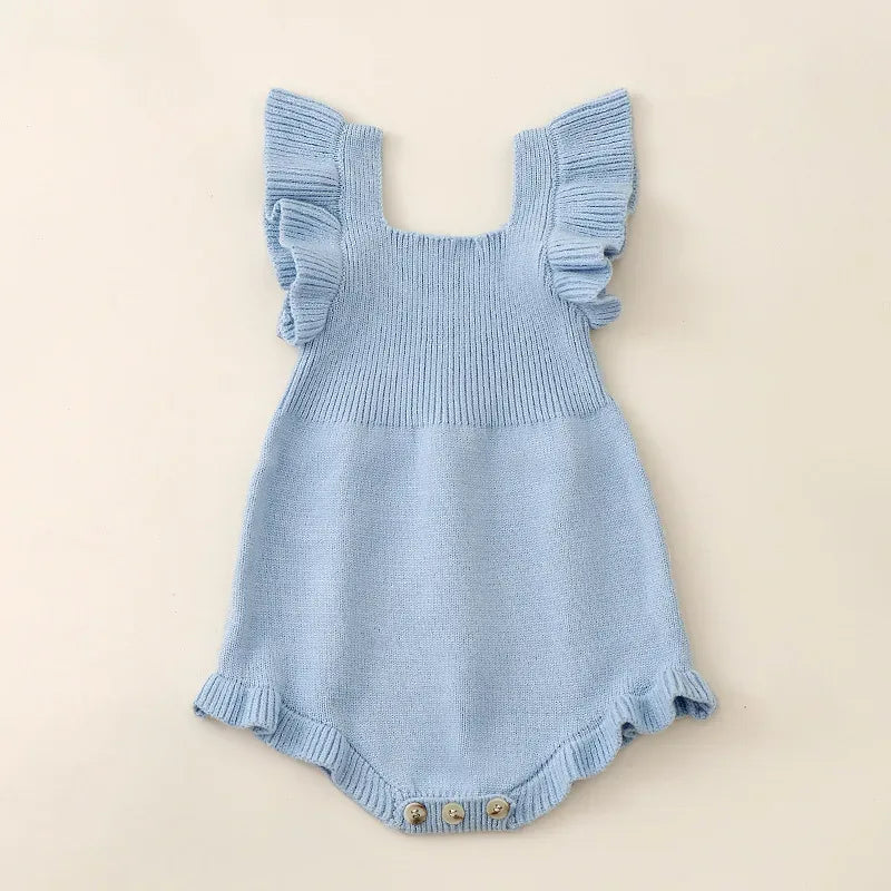 light blue ruffled knit romper for babies with flutter sleeves and button snap closure