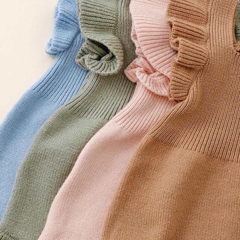 Ruffle knit romper for babies in blue green pink and brown colors with sleeveless design