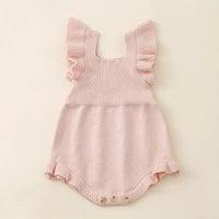 Pink ruffle knit romper for babies with sleeveless design and button closure for newborns