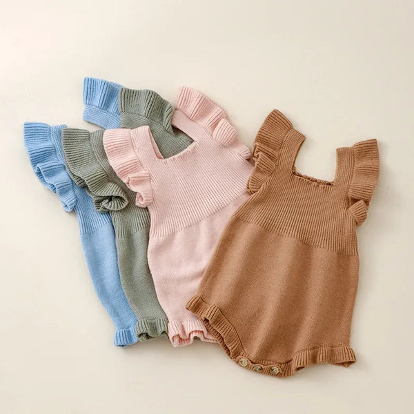 Ruffle knit romper for babies in blue, green, pink, and brown, knit baby clothes with short sleeves and ruffle details