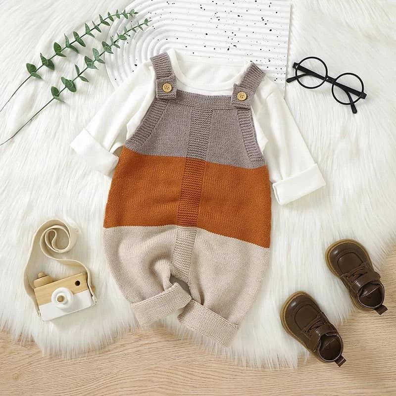 Neutral color knitted baby romper overalls for infants with white long sleeve shirt and brown shoes