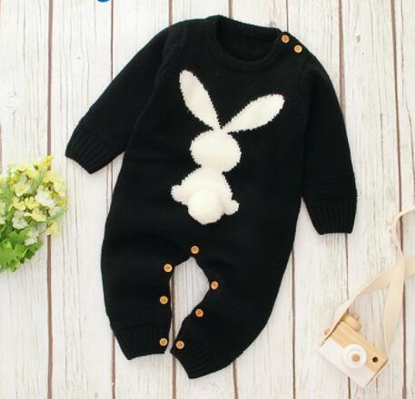 Black knitted baby romper with bunny design, long sleeve, for infants with button closures
