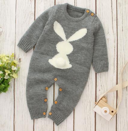 Gray knitted baby romper with bunny design for infants, long sleeve and button closures