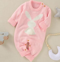pink knitted baby romper with bunny design, long sleeve, newborn size with button details
