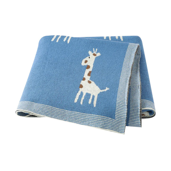 Blue knitted giraffe baby blanket for babies with white and brown giraffe pattern