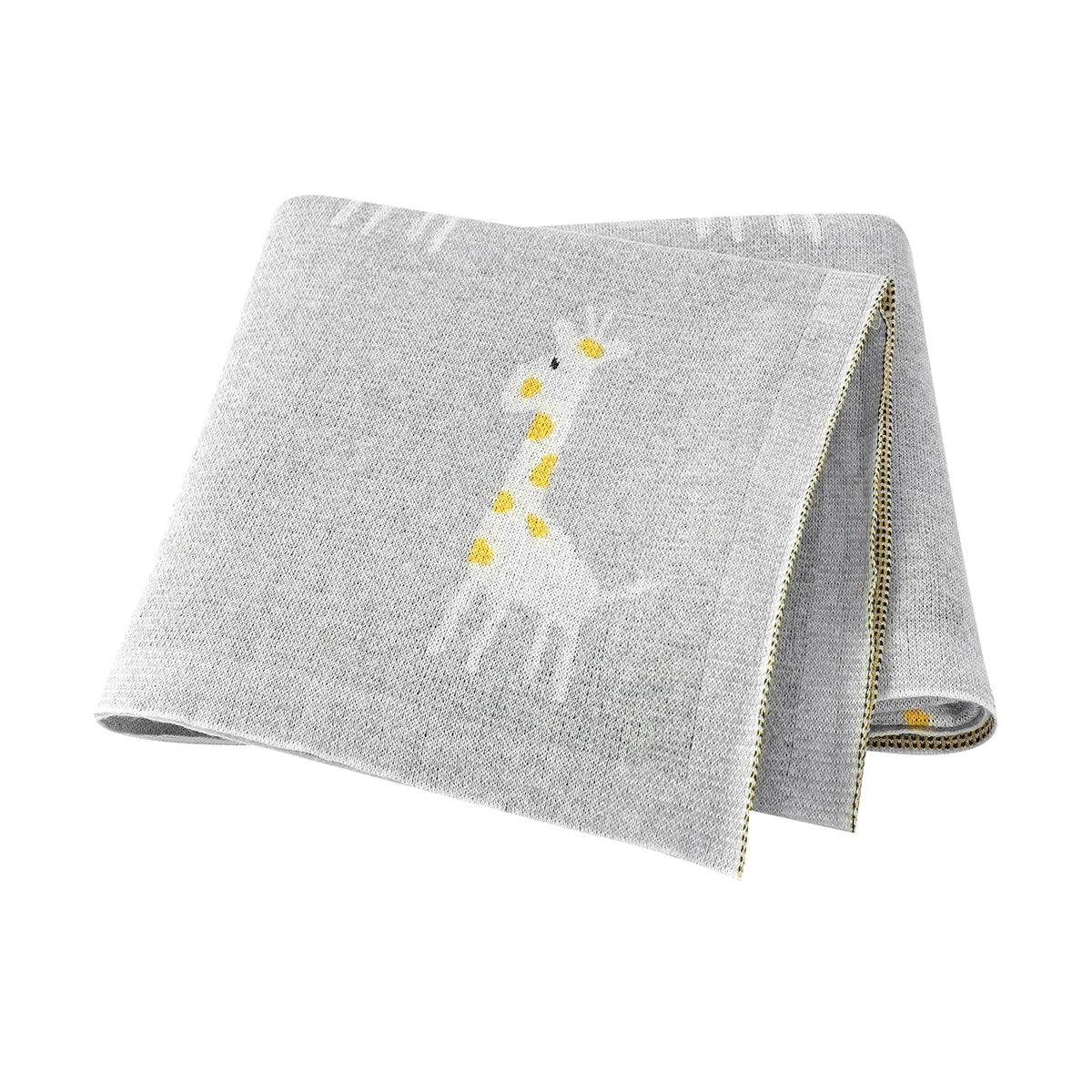 gray knitted giraffe baby blanket for infants with yellow and white giraffe pattern