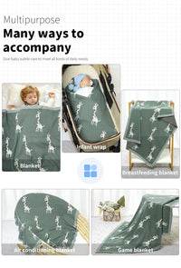 Green knitted giraffe baby blanket for infants and toddlers with white giraffe pattern, multipurpose use