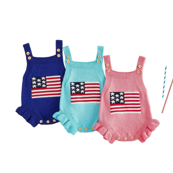 Knitted newborn romper in blue, turquoise, and pink with American flag design and button details for babies