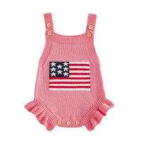 pink knitted newborn romper with American flag design and ruffled leg openings for babies