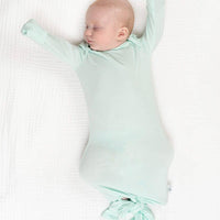 mint green newborn knotted sleep sacks for kids with long sleeves by Goosewaddle soft fabric
