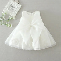 White lace and tulle toddler dress with large bow and floral appliques for baby girls