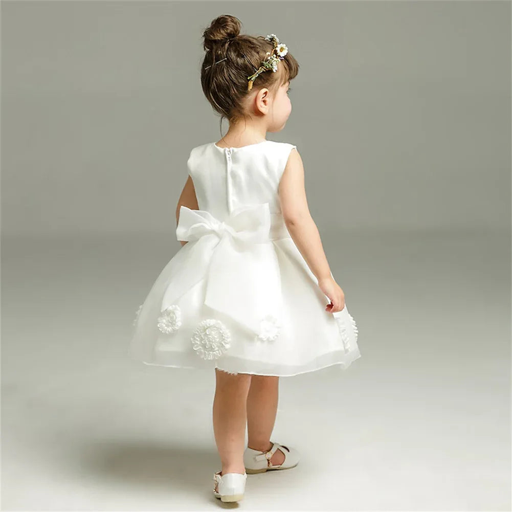 white lace and tulle toddler dress for girls with floral appliques and large bow at back