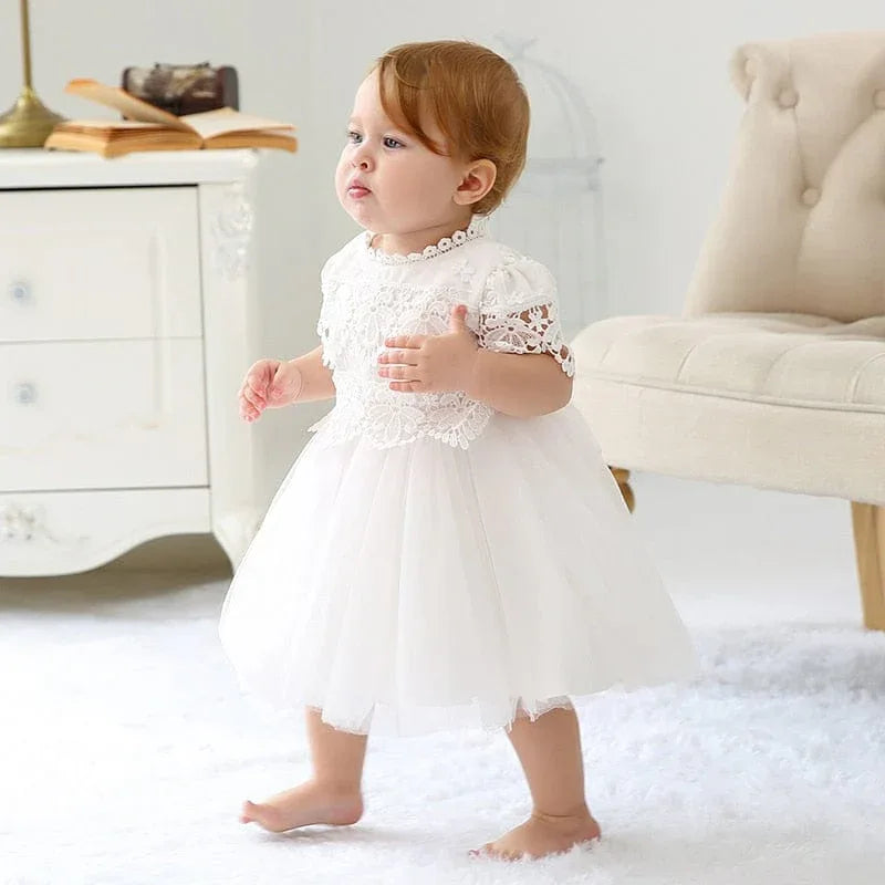 White lace baby girl dress with short sleeves and tulle skirt for toddlers