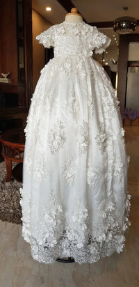 White lace baptism gown for babies with short sleeves and floral lace detailing