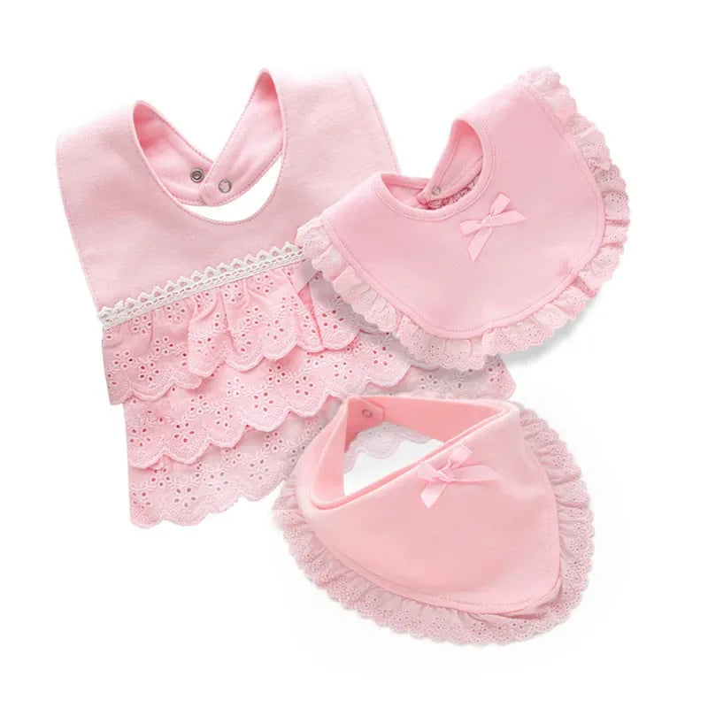 Pink lace bib for babies with ruffles and bows in small size for infants